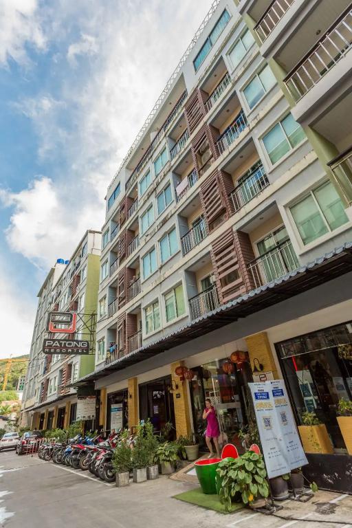 PJ Patong Resortel - Tap to explore photos