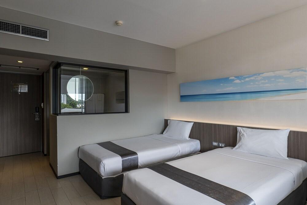 Pearl Hotel Phuket - Tap to explore photos