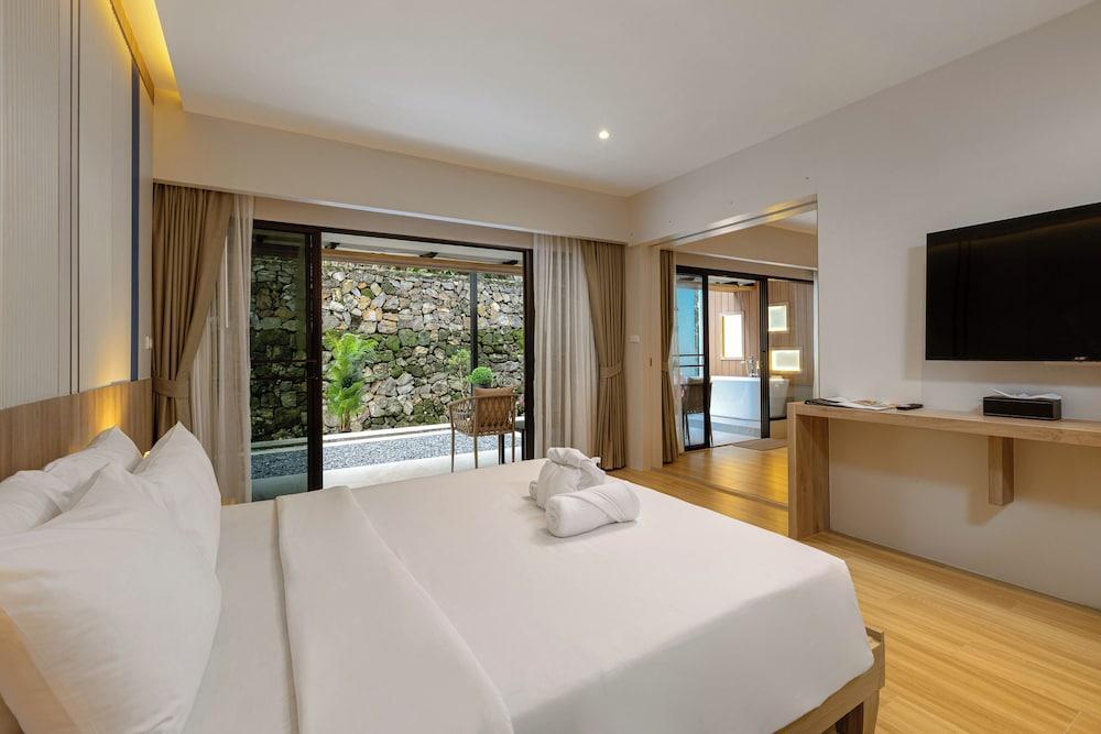 Patong Lodge Hotel Room Type - 2 Bedrooms Family Suite Garden view Patong Lodge Hotel Room Type - 2 Bedrooms Family Suite Garden view