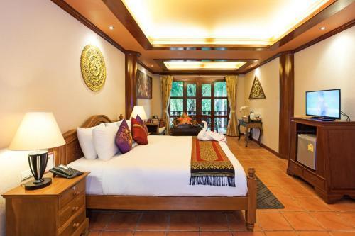 Royal Phawadee Village Room Type - Deluxe Suite Pool View Room with Balcony