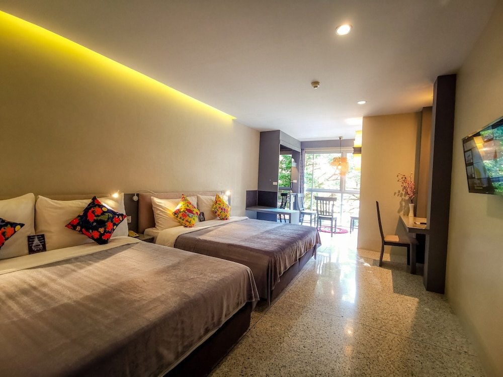 Sino House Phuket Hotel Room Type - Deluxe Quadruple Room Sino House Phuket Hotel Room Type - Deluxe Quadruple Room
