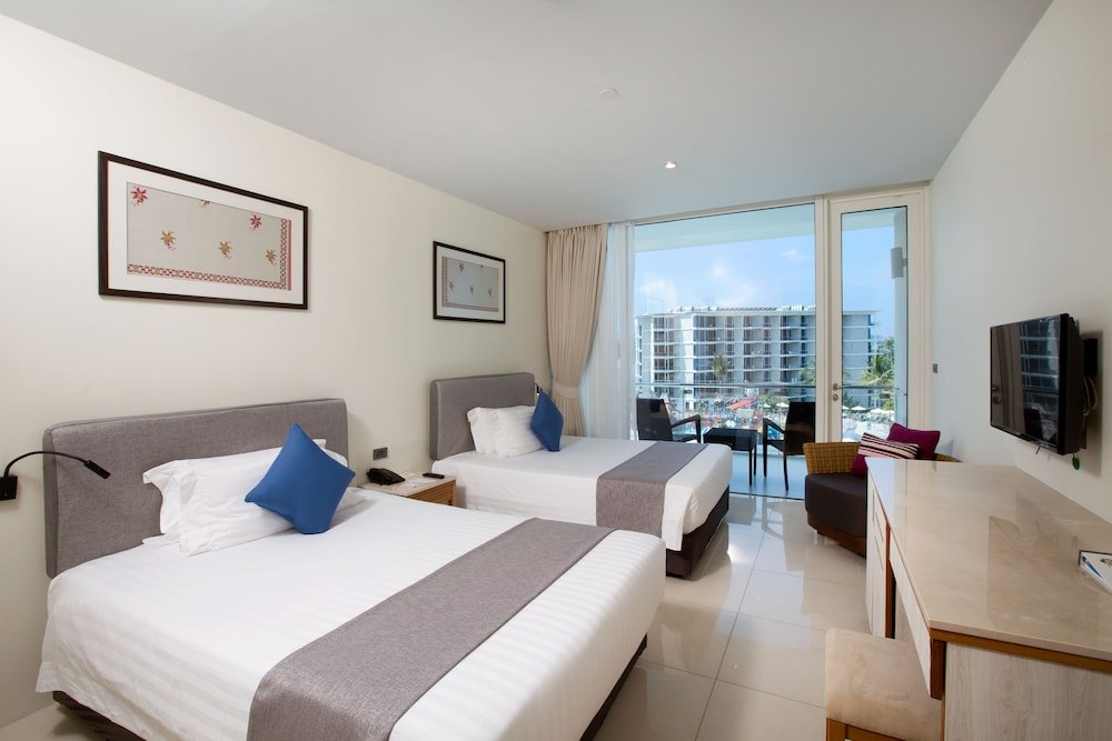 Splash Beach Resort  Room Type - DELUXE DOUBLE DOUBLE BALCONY 