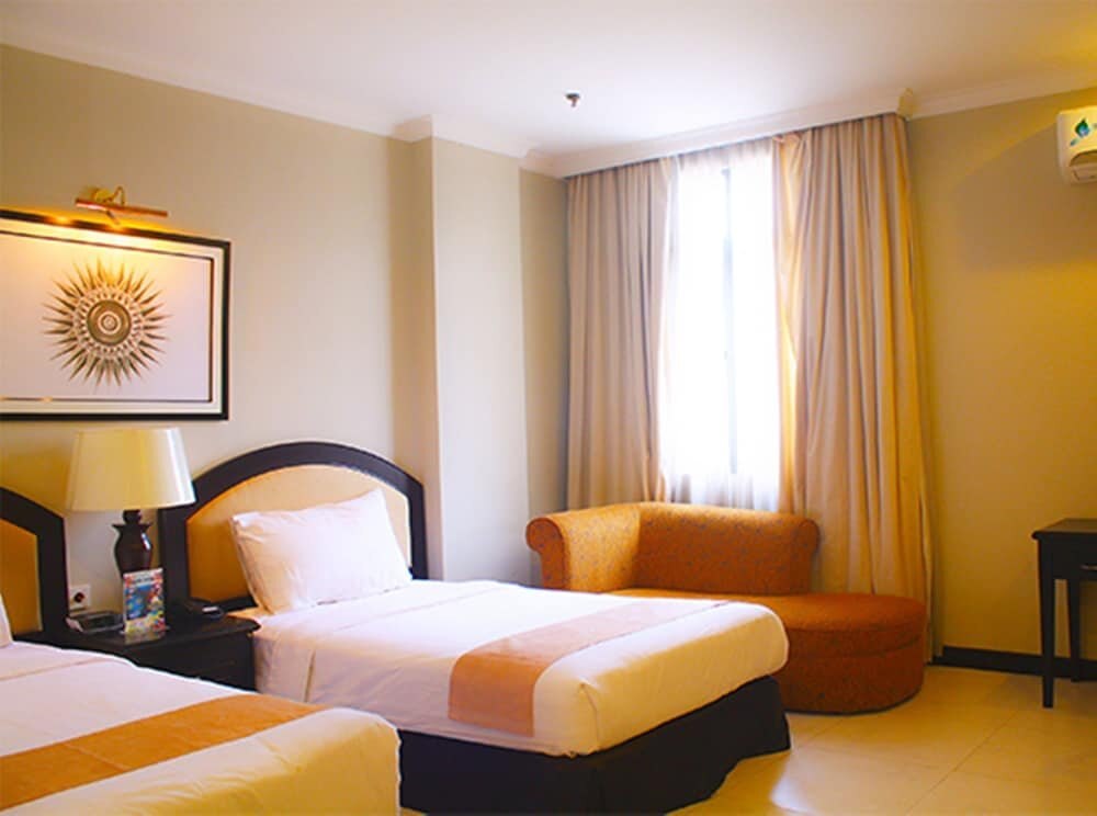 Puri Denpasar Hotel - Tap to explore photos