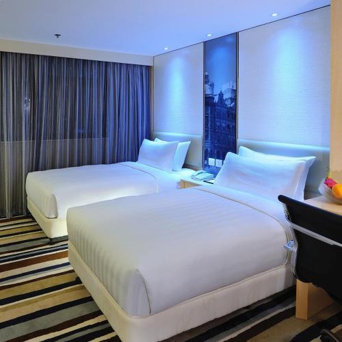 Metropark Hotel Mongkok - Tap to explore photos