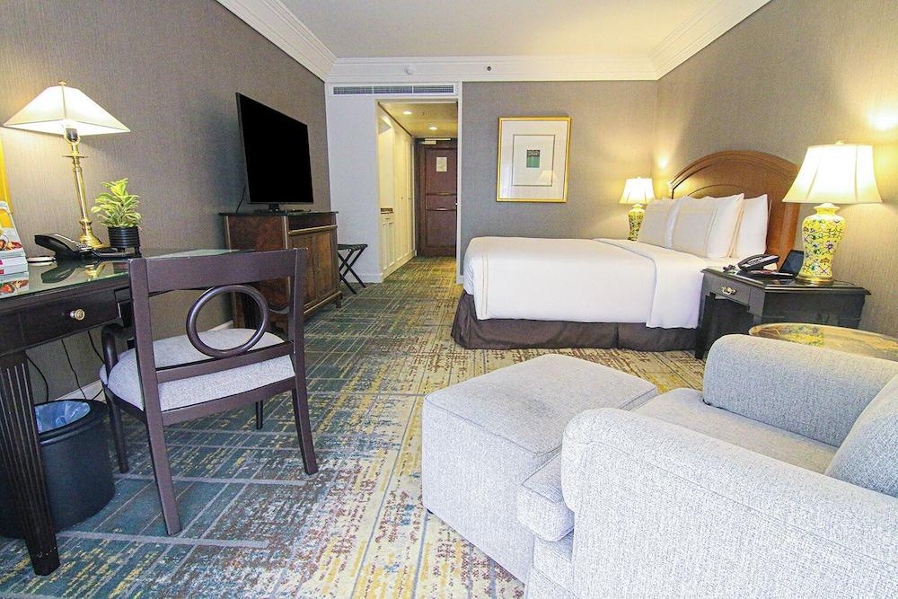 Grand Millennium Kuala Lumpur Room Type - Classic Room with One Queen Bed Grand Millennium Kuala Lumpur Room Type - Classic Room with One Queen Bed