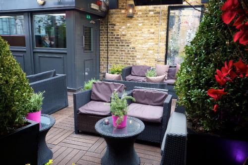 Karma Sanctum Soho - Tap to explore photos