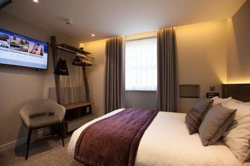Best Western Plus Delmere Hotel - Tap to explore photos