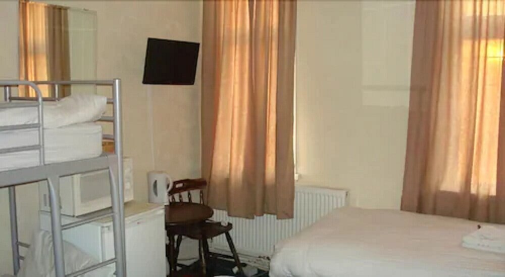 Forest Gate Hotel Room Type - Economy Triple Room, Shared Bathroom