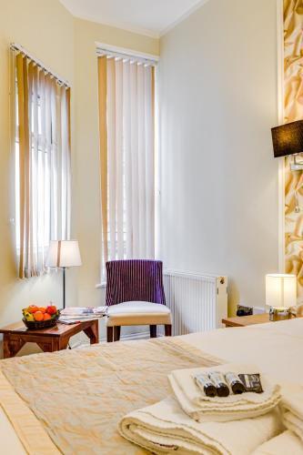 1 Lexham Gardens Hotel - Tap to explore photos
