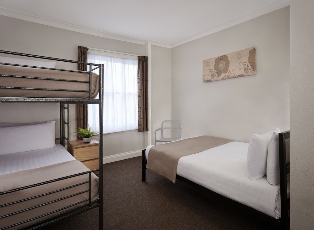Lords Hotel Room Type - Superior quad with bunk & double Lords Hotel Room Type - Superior quad with bunk & double