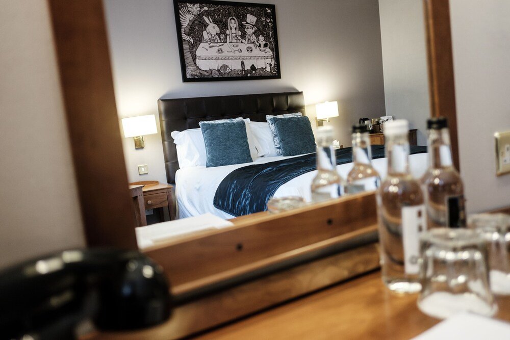 The Mad Hatter Hotel - Tap to explore photos