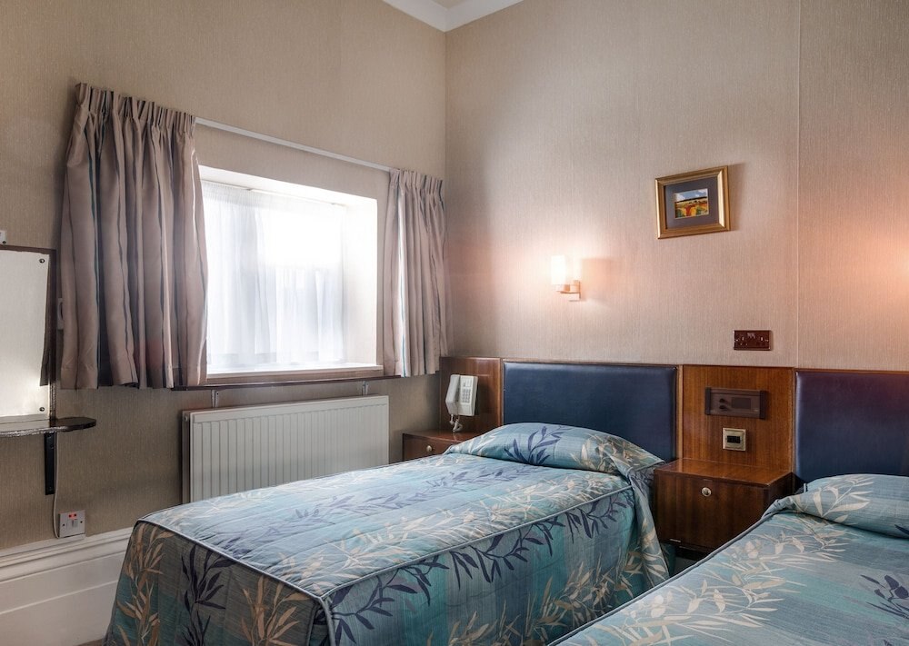 Mitre House Hotel Room Type - Family Suite 5 (Two adjoining rooms with a shared bathroom) Mitre House Hotel Room Type - Family Suite 5 (Two adjoining rooms with a shared bathroom)