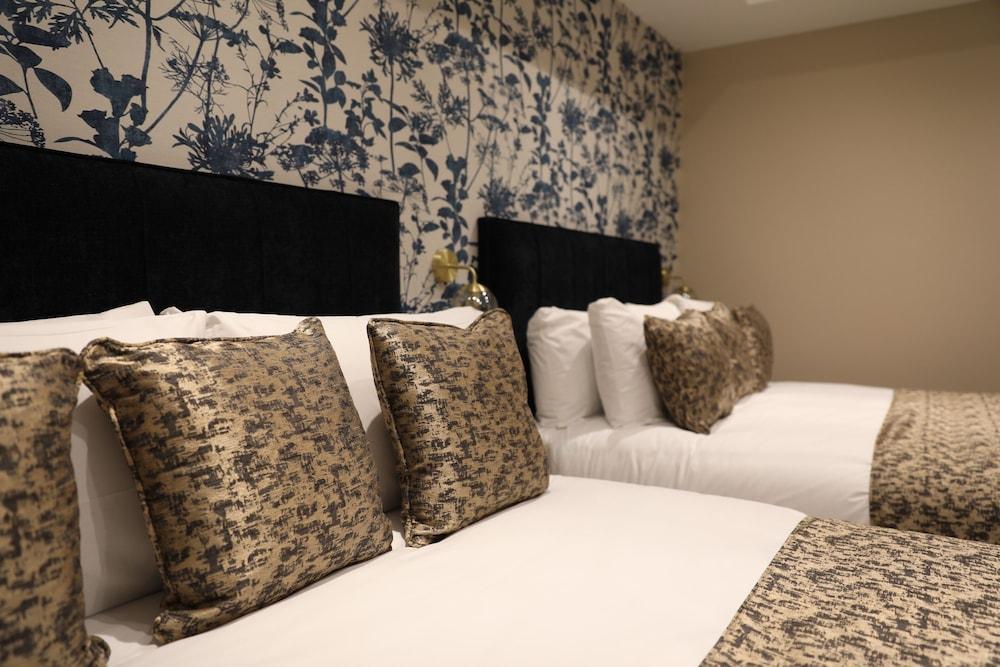 Reem Hotel Room Type - Classic Quadruple Room