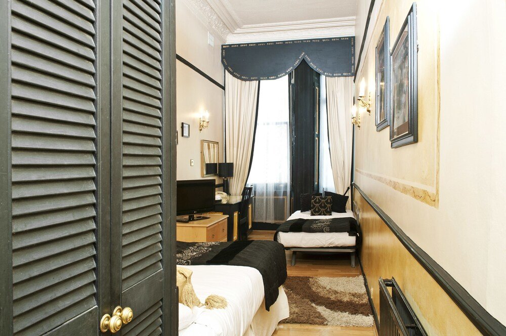 Rushmore Hotel Room Type - Triple Room Rushmore Hotel Room Type - Triple Room
