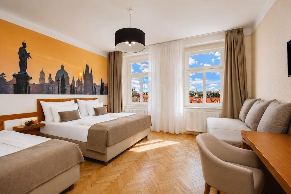 Hotel Merkur - Czech Leading Hotels Room Type - Quadruple Room Hotel Merkur - Czech Leading Hotels Room Type - Quadruple Room