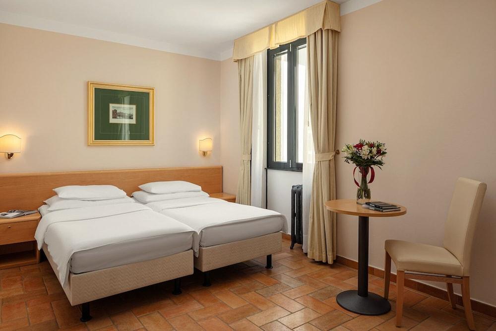 Hotel Roma Prague - Tap to explore photos