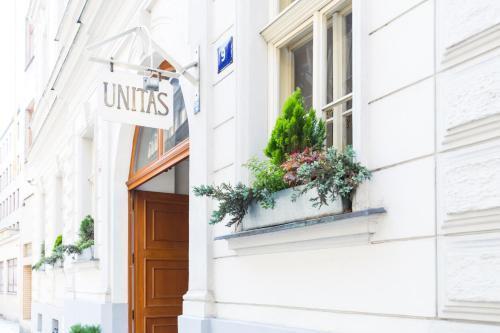 Unitas Hotel - Tap to explore photos
