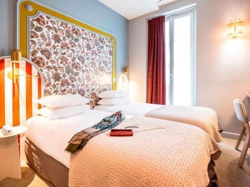 Mercure Paris Notre Dame Saint Germain des Prés - Tap to explore photos