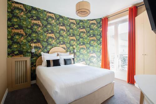 Hotel des Batignolles - Tap to explore photos