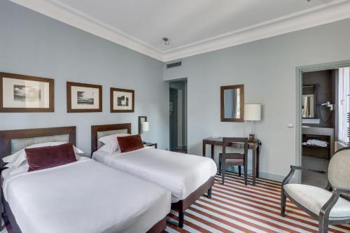 Hotel Duret - Tap to explore photos