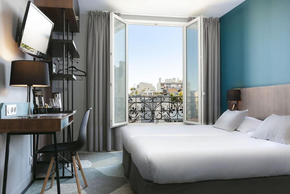 Hotel Montparnasse Alesia - Tap to explore photos