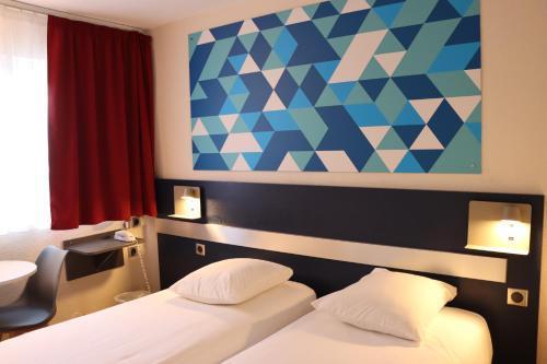 Comfort Hotel Paris Porte d'Ivry - Tap to explore photos