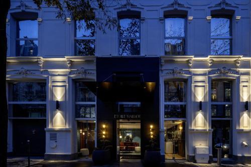 Hotel Etoile Maillot - Tap to explore photos
