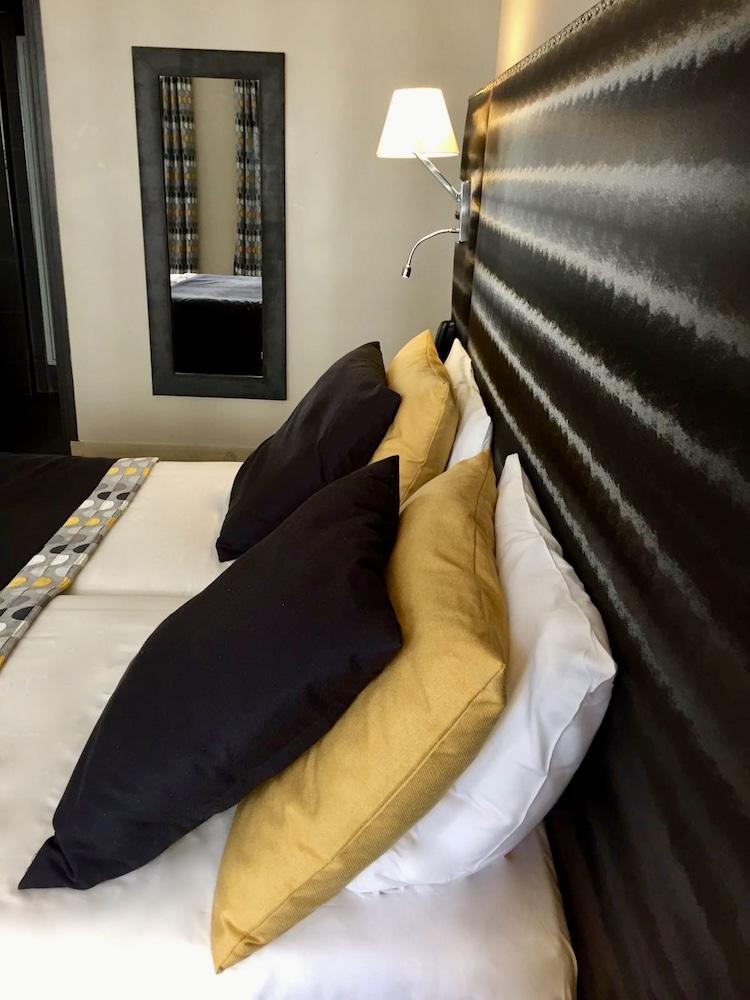 Hotel Migny Opera Montmartre - Tap to explore photos