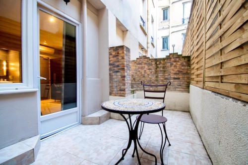 Hotel Migny Opera Montmartre - Tap to explore photos