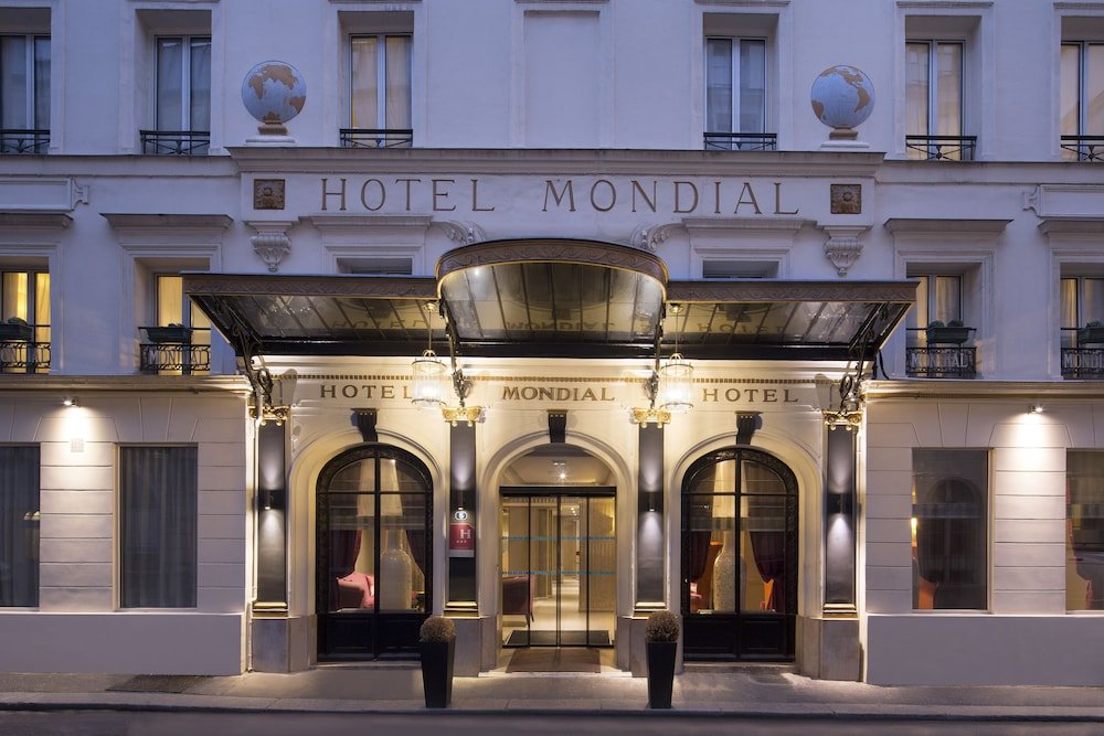 Hôtel Mondial - Tap to explore photos