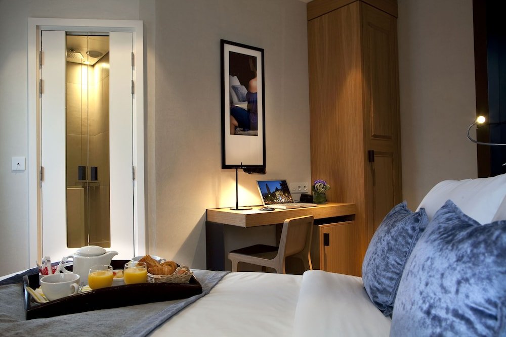 Hotel Marceau Champs Elysees - Tap to explore photos