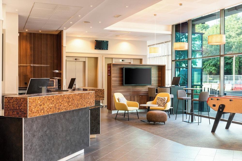 Courtyard by Marriott Paris Saint Denis - Tap to explore photos