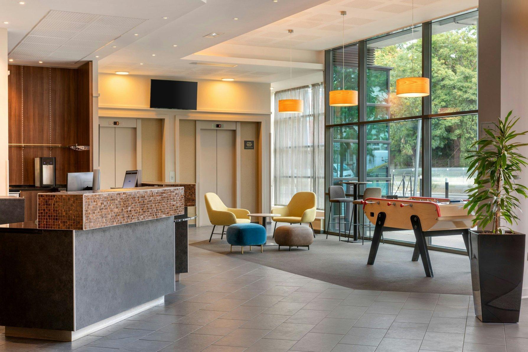 Courtyard by Marriott Paris Saint Denis - Tap to explore photos