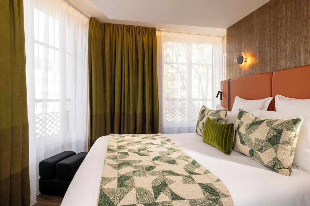 Hôtel Raspail Montparnasse - Tap to explore photos
