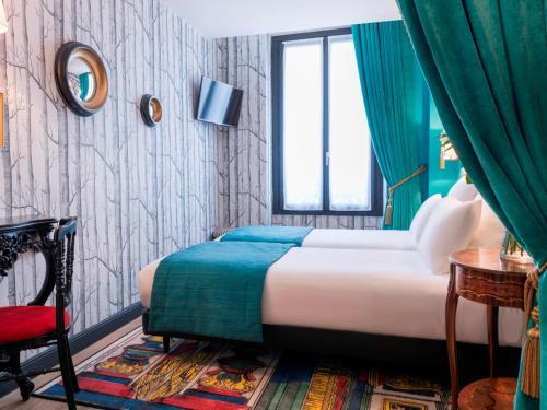 Hôtel Sacha Room Type - Chambre grand lit ou lits jumeaux