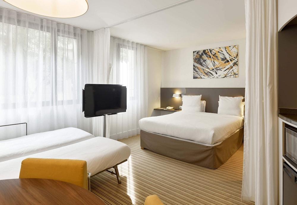 Novotel Suites Paris Rueil Malmaison - Tap to explore photos