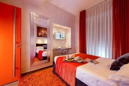 Hotel Ariston - Tap to explore photos