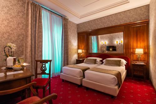 Atlante Star Hotel - Tap to explore photos