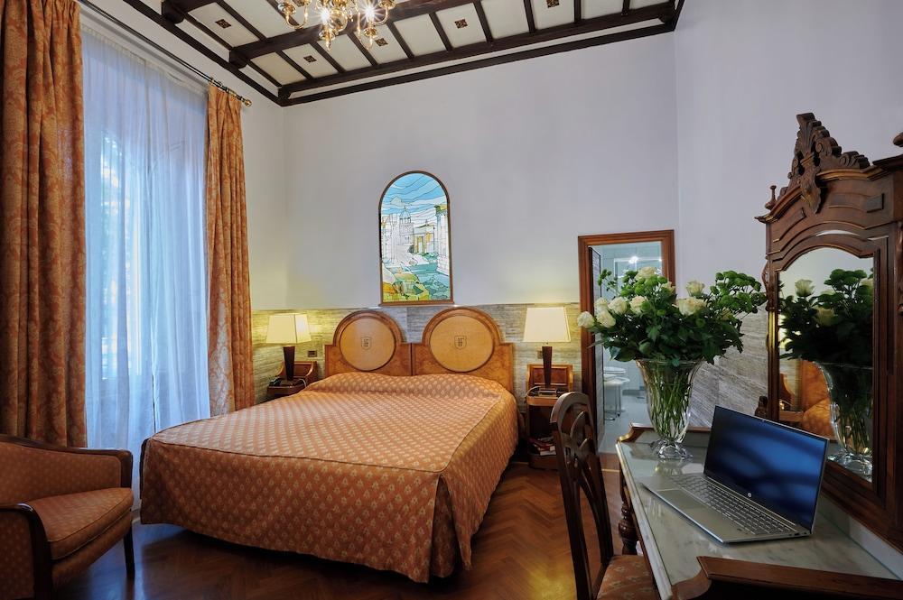 Hotel Farnese - Tap to explore photos