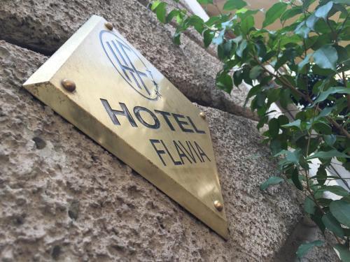 Hotel Flavia - Tap to explore photos