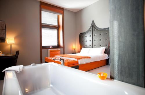 Orange Hotel - Tap to explore photos