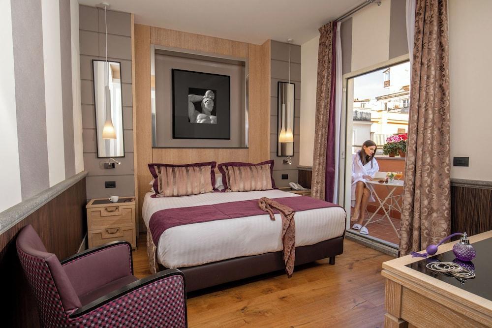 The Inn at the Spanish Steps - Tap to explore photos