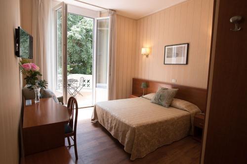 Hotel Villa delle Rose - Tap to explore photos