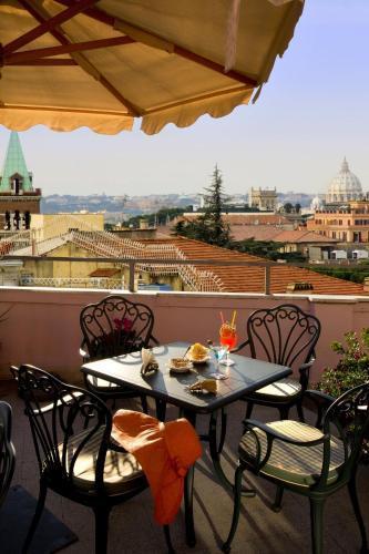 Marcella Royal Hotel - Rooftop Garden - Tap to explore photos