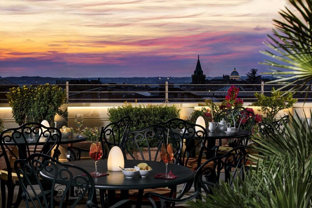 Marcella Royal Hotel - Rooftop Garden - Tap to explore photos