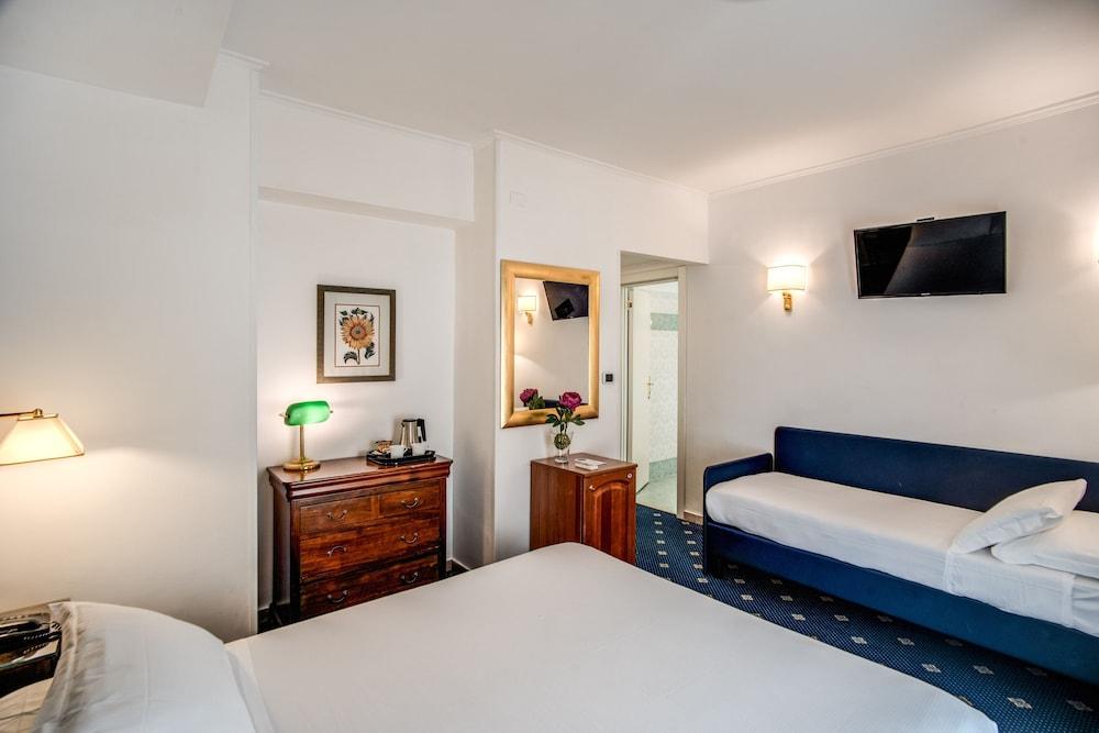 Napoleon Hotel Room Type - Triple Room Napoleon Hotel Room Type - Triple Room