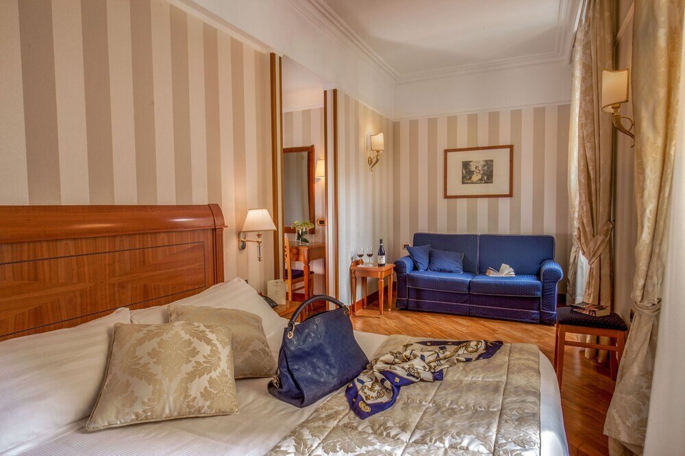 Albergo Ottocento Room Type - Triple Room Albergo Ottocento Room Type - Triple Room