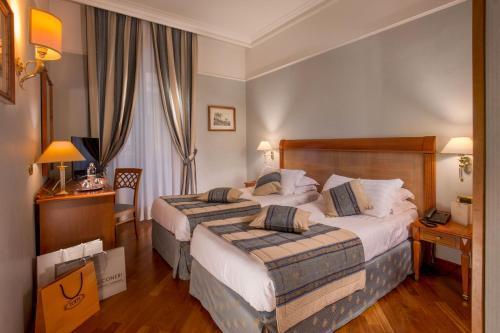 Albergo Ottocento - Tap to explore photos