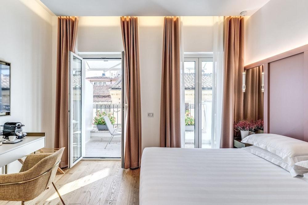 Relais Trevi 95 Boutique Hotel - Tap to explore photos