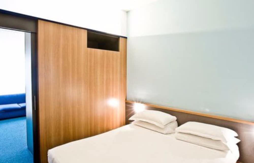 Hotel Ripa Roma Room Type - Standard Quadruple Room, 1 Double Bed with Sofa bed, Balcony Hotel Ripa Roma Room Type - Standard Quadruple Room, 1 Double Bed with Sofa bed, Balcony